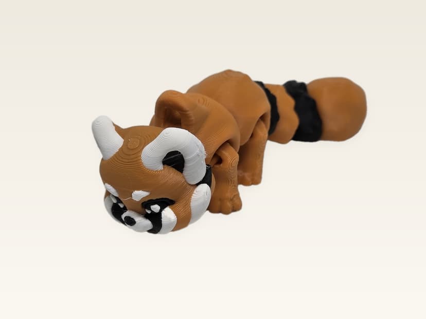 Articulated red panda figure